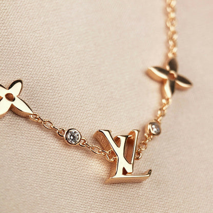 [OAK JURI]STAR AND SUN 7 MOTIFS GOLD BRACELET