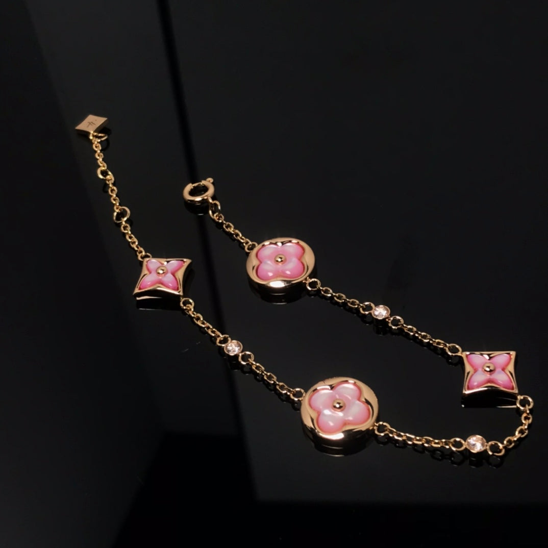 [OAK JURI]STAR AND SUN 4 MOTIF PINK MOP PINK GOLD BRACELET