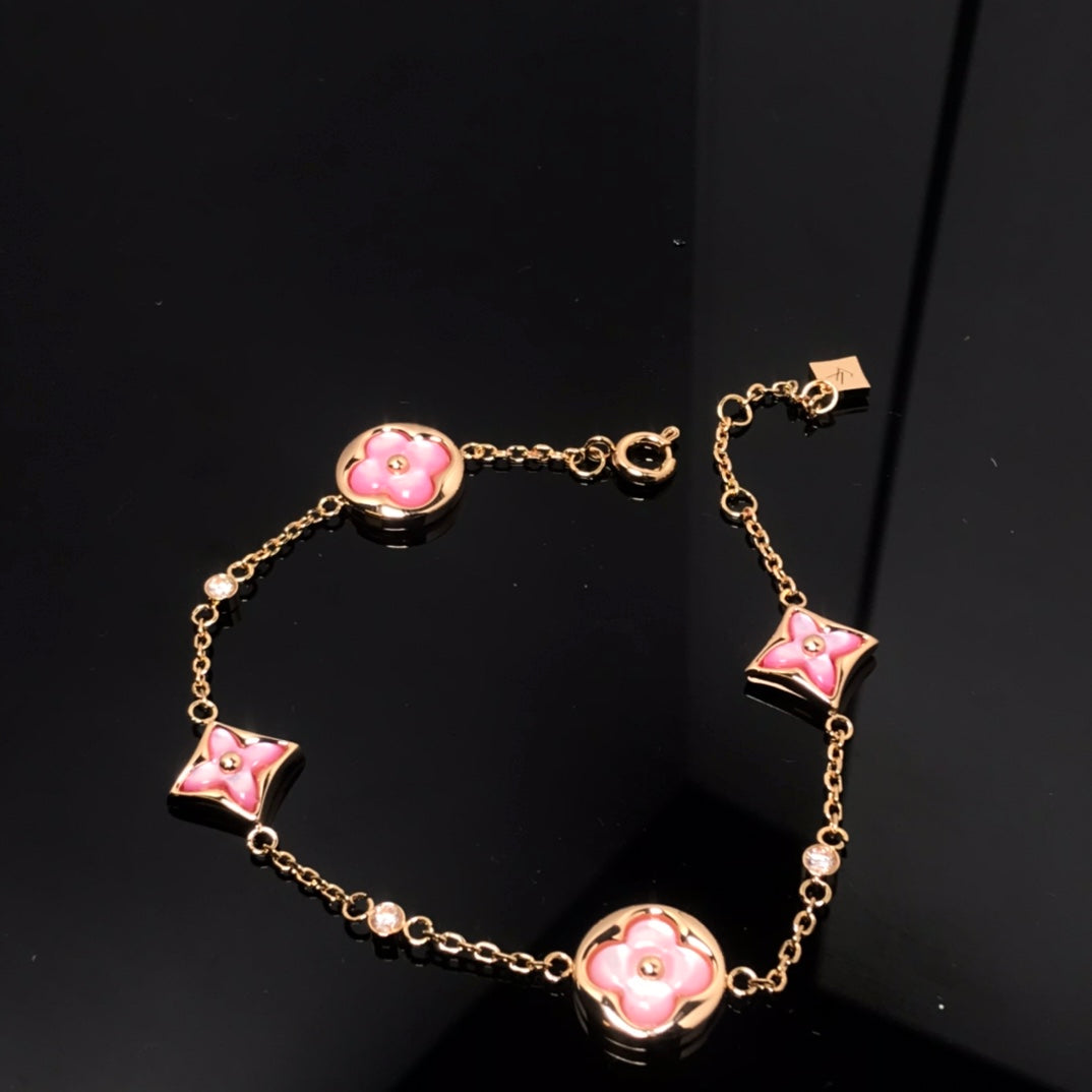 [OAK JURI]STAR AND SUN 4 MOTIF PINK MOP PINK GOLD BRACELET