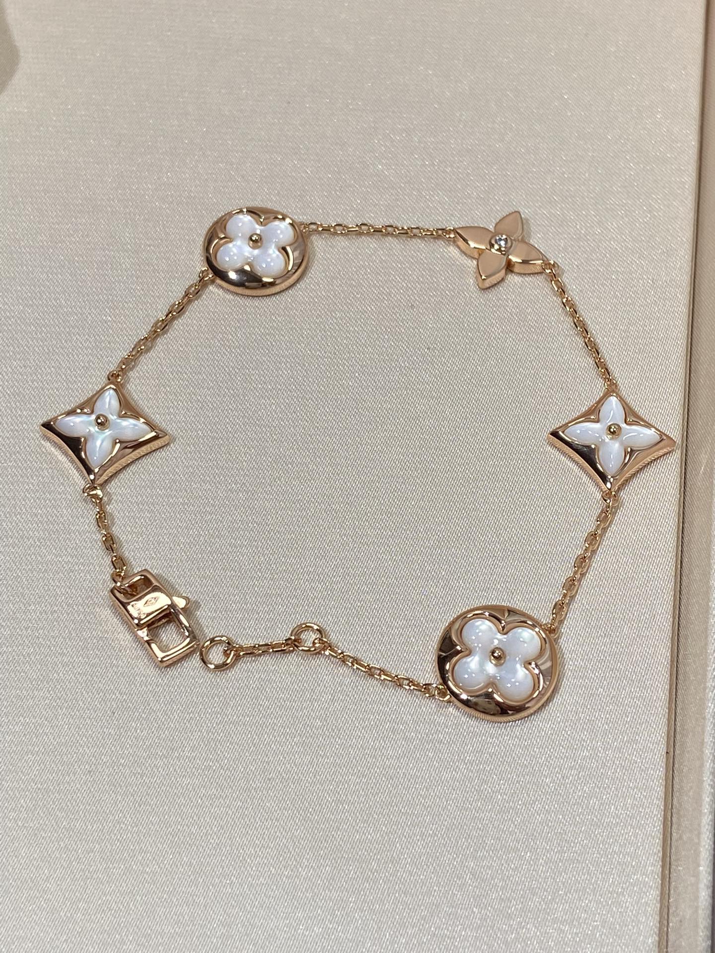 [OAK JURI]STAR AND SUN 5 MOTIF MOP PINK GOLD BRACELET