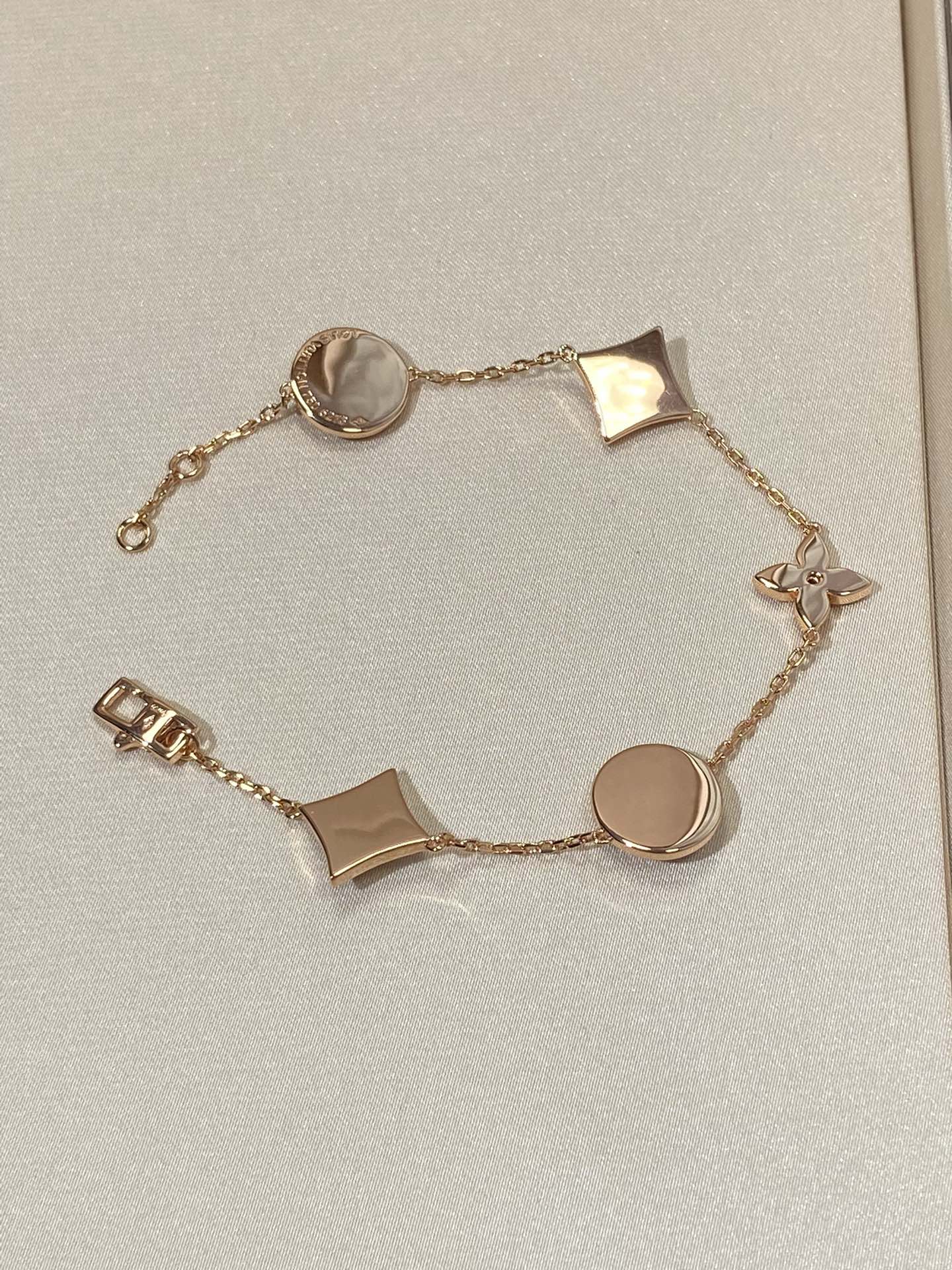 [OAK JURI]STAR AND SUN 5 MOTIF MOP PINK GOLD BRACELET