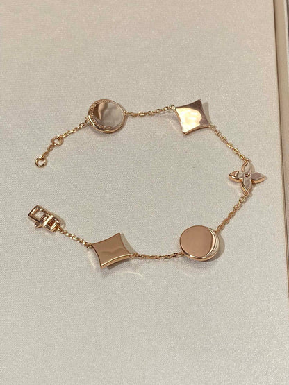 [OAK JURI]STAR AND SUN 5 MOTIF MOP PINK GOLD BRACELET