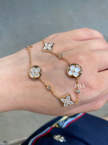 [OAK JURI]STAR AND SUN 4 MOTIF WHITE MOP PINK GOLD BRACELET