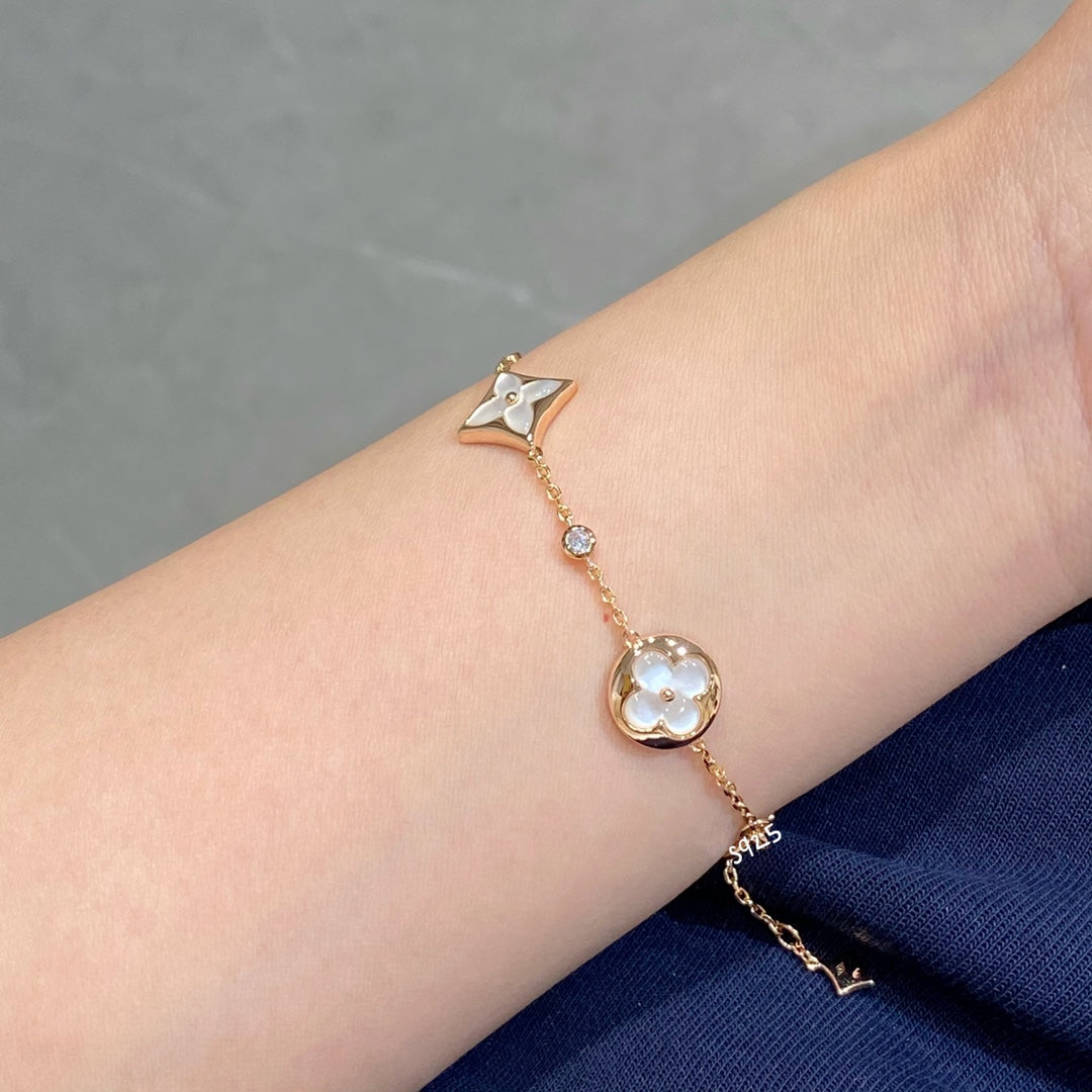 [OAK JURI]STAR AND SUN 4 MOTIF WHITE MOP PINK GOLD BRACELET