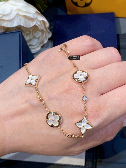 [OAK JURI]STAR AND SUN 4 MOTIF WHITE MOP PINK GOLD BRACELET