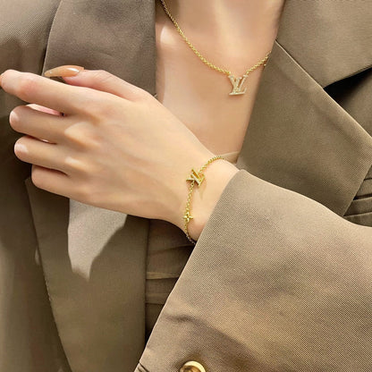 [OAK JURI]LOGO STAR MOTIF GOLD BRACELET